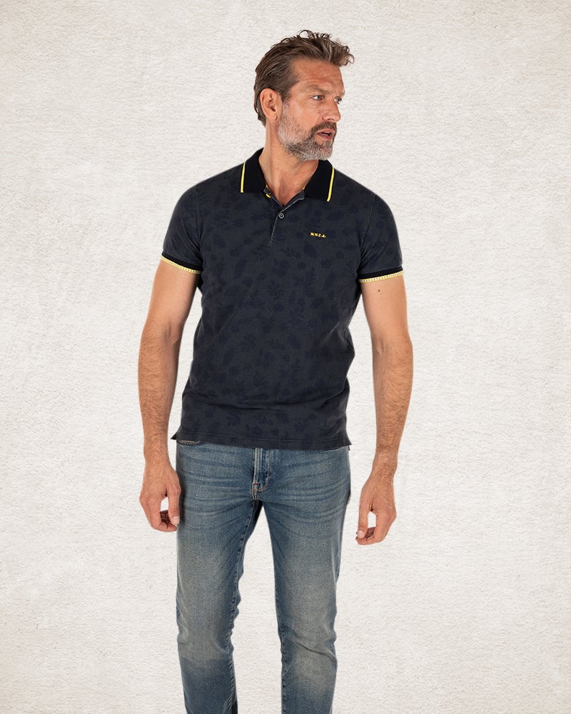 Navy polo shirt with leaf print